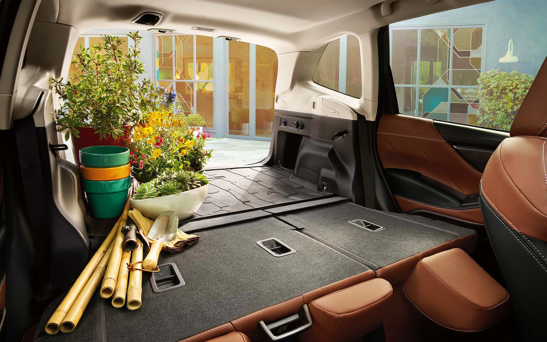 The rear cargo area of the 2022 Forester with the rear seats folded down. | Sierra Subaru of Monrovia in Monrovia CA