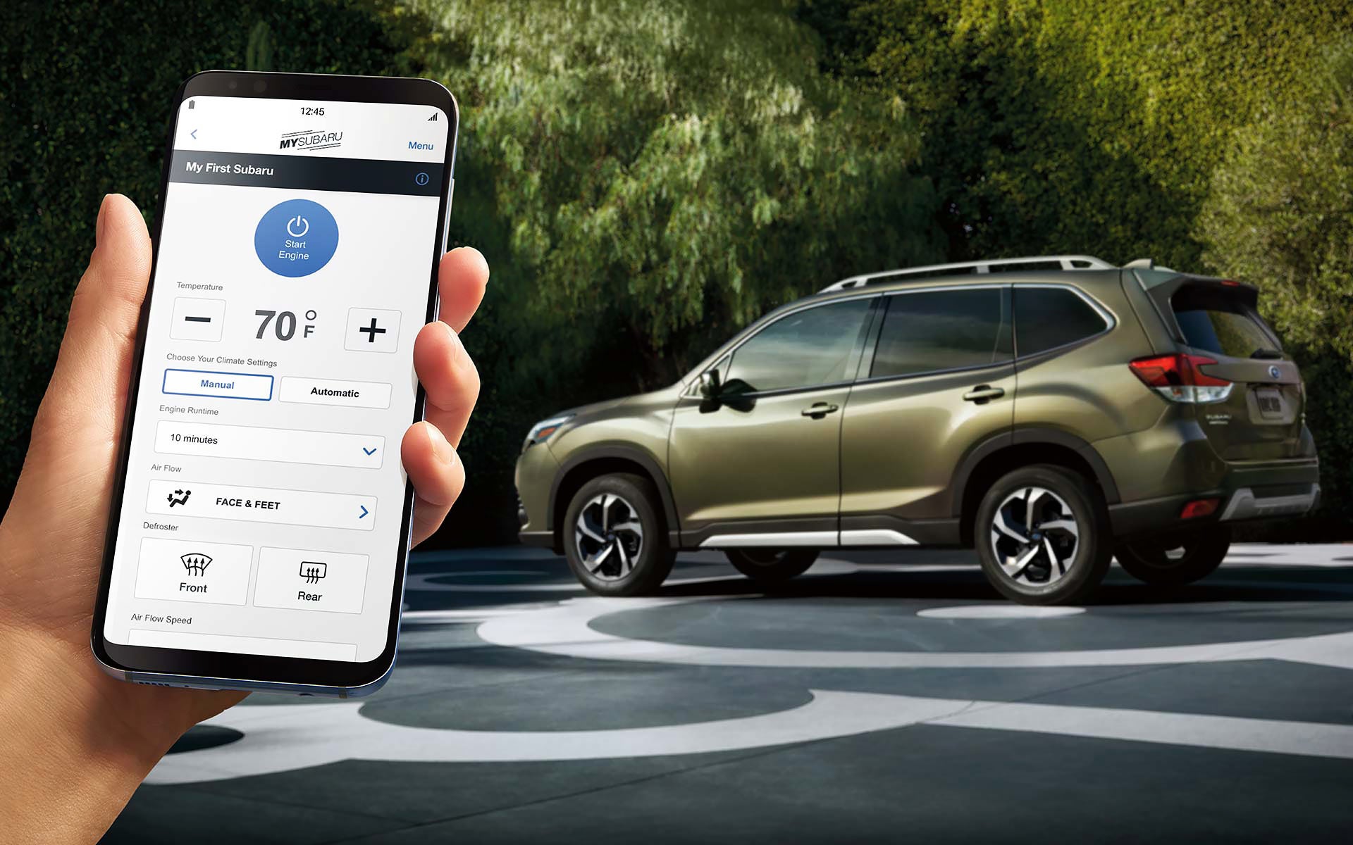 A close-up of a phone showing the Remote Engine Start with Climate Control feature of SUBARU STARLINK® Safety and Security available on the 2022 Forester. | Sierra Subaru of Monrovia in Monrovia CA